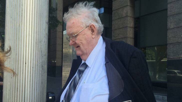 Paedophile priest Robert Flaherty leaves Downing Centre Court. Photo: Tim Barlass