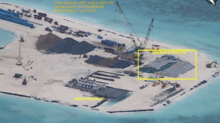 Kennan Reef, July 29. An increased number of construction equipment, materials and container vans used as shelter for the workers appear.