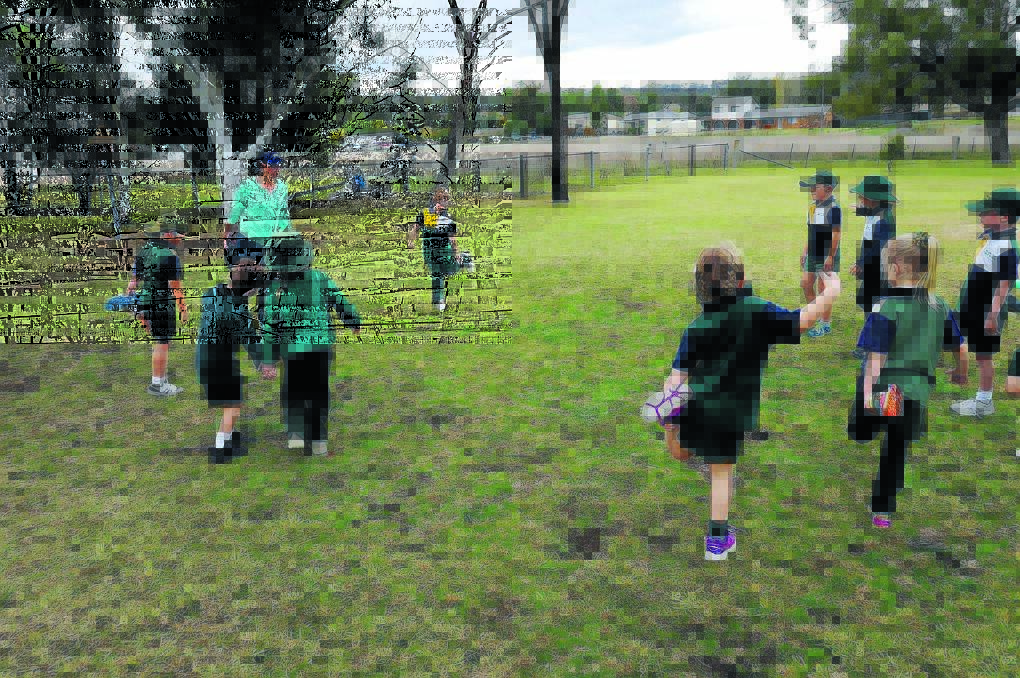 Willow Tree Public students warm up for athletics training
