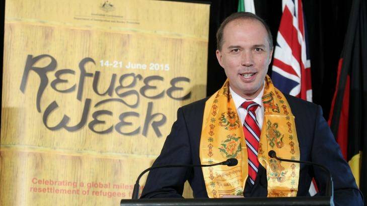Immigration Minister Peter Dutton delivers his address during the Refugee Week event at Parliament House in Canberra yesterday. Photo: Alex Ellinghausen