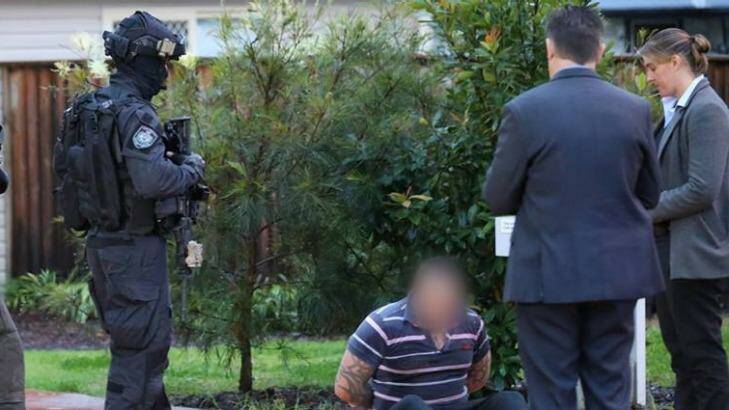 Police arrest the Rebels president at his home in Kingswood, in Sydney's west, on Friday. Photo: Facebook