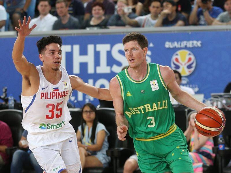 Australia remain unbeaten in FIBA World Cup qualification with a tough win over the Philippines.