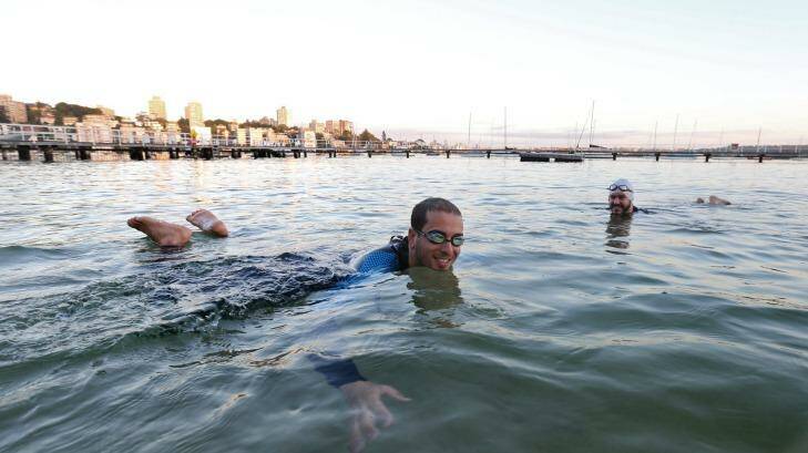 Regular early swimmers in the harbour Guy Klamer and Alan Sacharowitz at Murray Rose Pool. Photo: Peter Rae