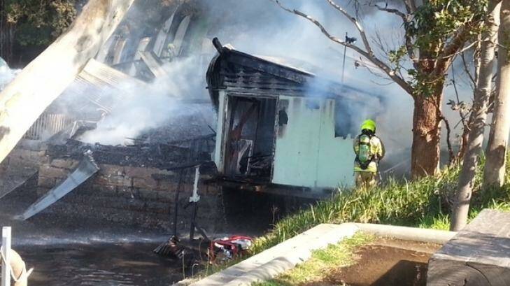 A fire has destroyed a boatshed near to Gladesville Hospital.   Photo: Terry Handel 