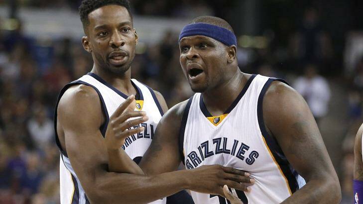 Tough cookie: Memphis Grizzlies veteran Zach Randolph is restrained by Jeff Green after he was called for a technical foul after getting into a brief altercation with Sacramento Kings centre DeMarcus Cousins. Photo: Rich Pedroncelli