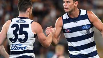 Patrick Dangerfield (L) and Tom Hawkins (R) will return for Geelong's clash with Brisbane. (Darren England/AAP PHOTOS)