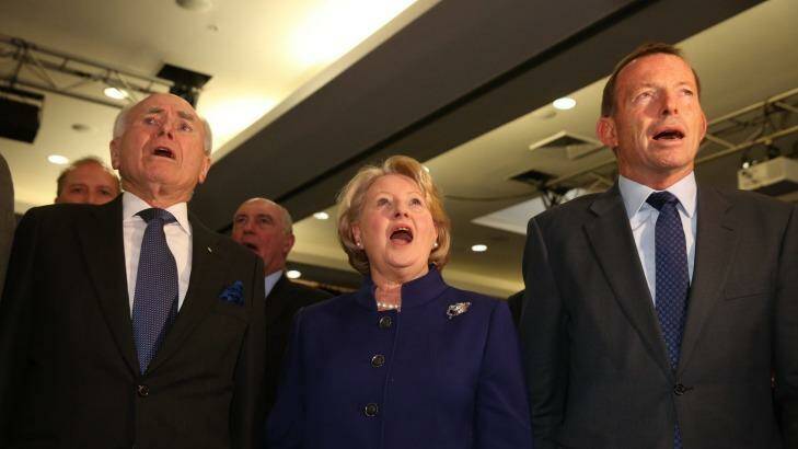 Tony Abbott with John and Janette Howard at the Coalition national campaign. Photo: Andrew Meares
