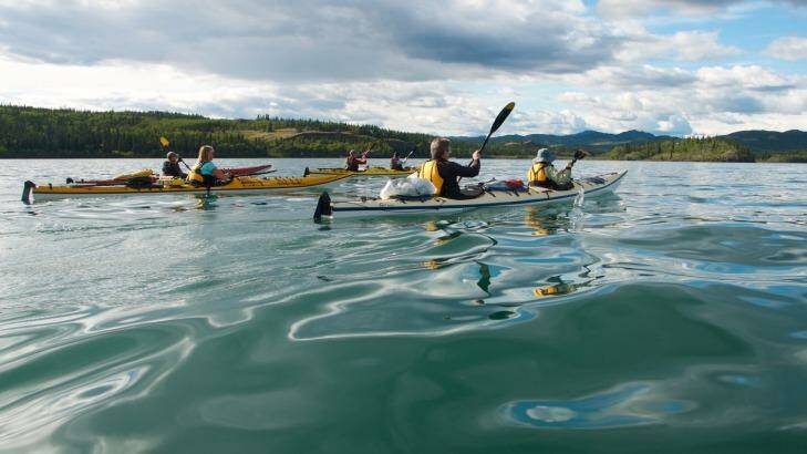 Paddling across Lake Laberge before the wind whips up. Photo: Elspeth Callender