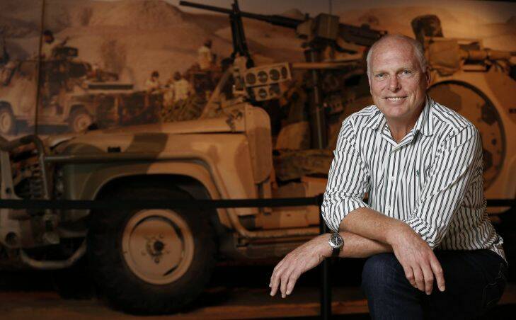 News.  Retired Major General Jim Molan next to a Long Range Patrol Vehicle in the Conflicts 1945 to Today Gallery at the Australian War Memorial.  26 December 2012     Canberra Times Photo by Jeffrey Chan