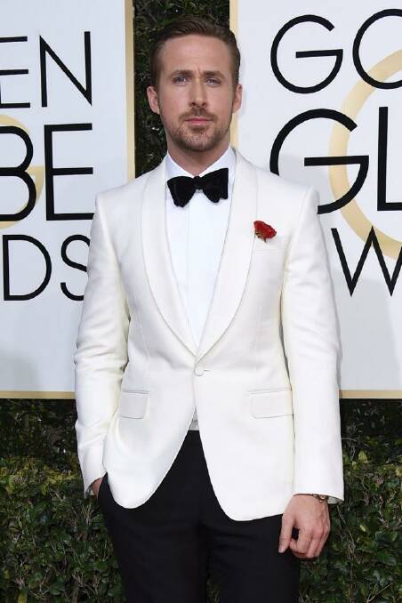Ryan Gosling looking dapper in a La La Land inspired suit. Photo: Jordan Strauss