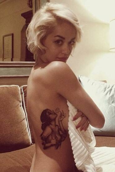 Rita Ora permanently inked a pin-up girl, called Rosetta, onto her ribs. Photo: BangBangNYC/Instagram