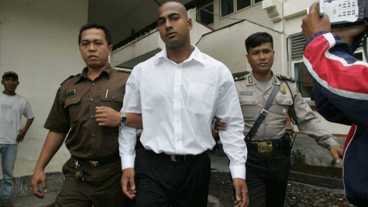Indonesian guards escort Australian Myuran Sukumaran to court in Denpasar, Bali. 