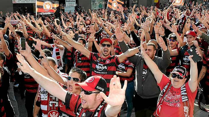 Here we come: Wanderers fans take over Caxton Street on their way to the Cauldron. Photo: Matt Roberts