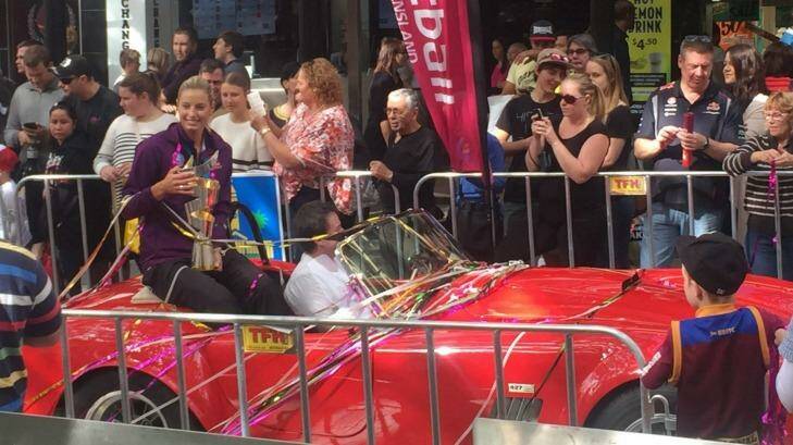 The Firebirds were greeted with a ticker tape parade in Brisbane today. Photo: Beth Newman
