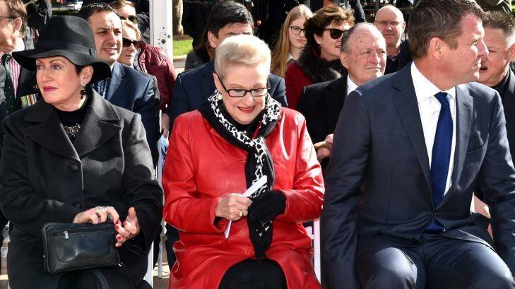 About face: Lord Mayor Clover Moore, Bronwyn Bishop and NSW Premier Mike Baird at the Anzac memorial. Photo: Steven Siewert