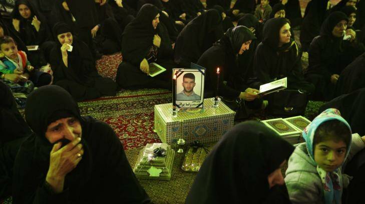 A scene during the memorial service for murdered asylum-seeker Reza Barati at the Al-Mahdi mosque in Tehran in 2014. Photo: Kate Geraghty