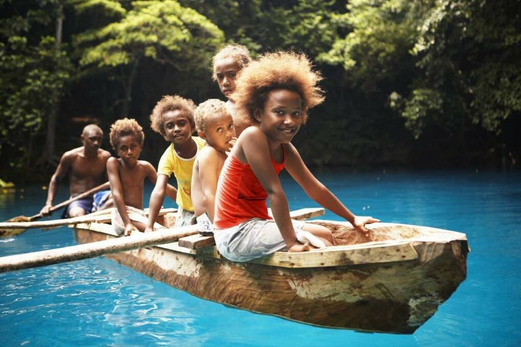 Dugout canoes ply the rivers of Vanuatu. Photo: David Kirkland