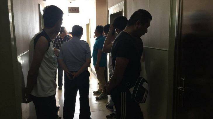 Unidentified plain-clothes men occupy <i>Yanhuang Chunqiu</i>'s offices on July 26, 2016.  Photo: Supplied