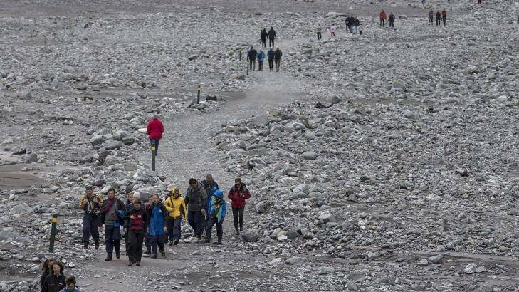 Tourists heading to and from the glacier were required to use the walking track as the no-fly zone was extended.
 Photo: Iain McGregor