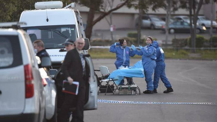 Forensic police are examining a house in Mount Druitt where a woman's body was found. Photo: Nick Moir