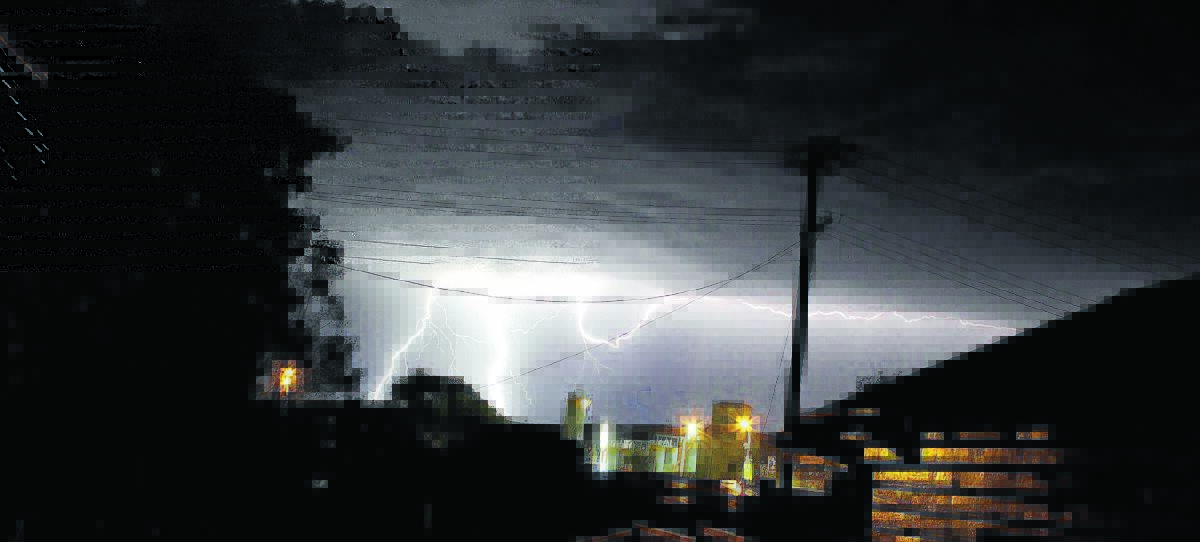 NIGHT LIGHTS: Jillian Carlon snapped these strikes over Oxley Vale from West Tamworth.