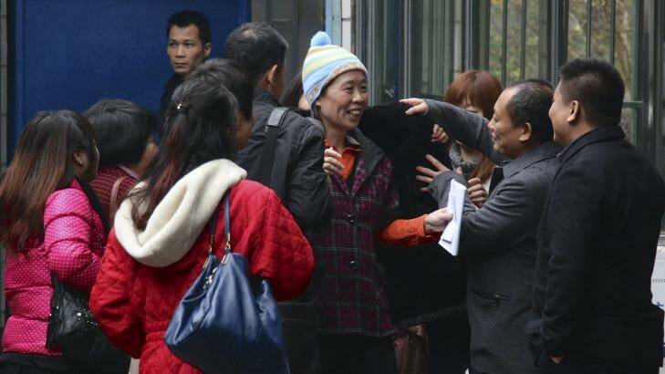 Relief: Charlotte Chou was immediately swamped by family and friends. Photo: Sanghee Liu