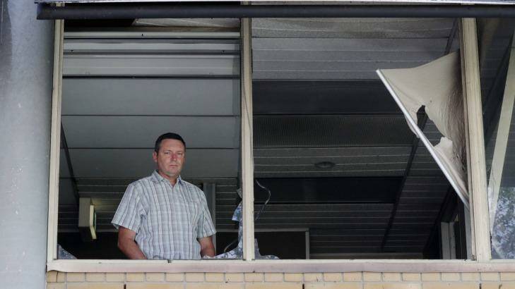 Lyle Shelton managing director of the Australian Christian Lobby in the office his executive assistant after a van with gas bottles exploded.  Photo: Andrew Meares