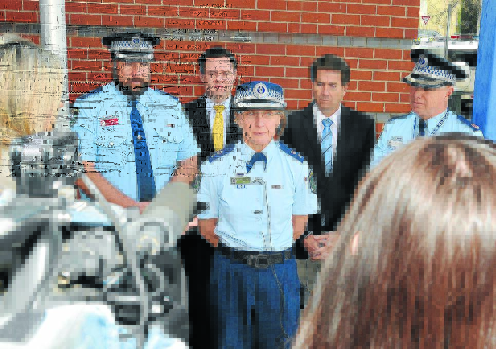 NO PROMISES: Dog Squad Commander Donna Adney, with Oxley Acting Superintendent Paul Johnson, left, Police Minister Stuart Ayres and MP Kevin Anderson.290814GOC01