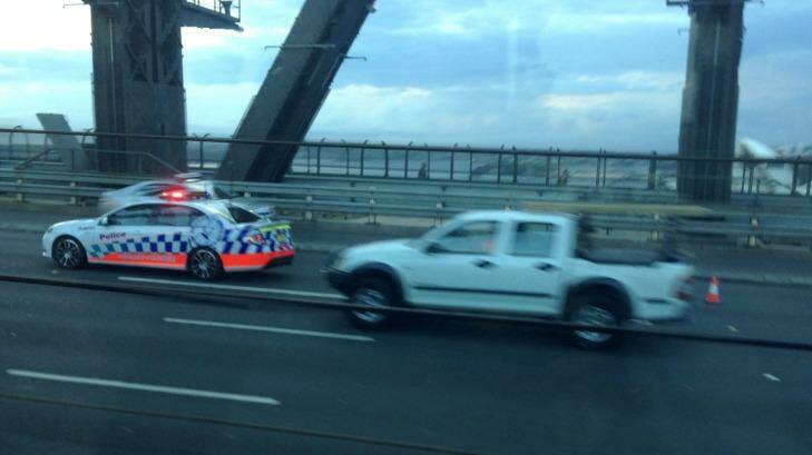 Emergency services vehicles on the Sydney Harbour Bridge this morning. Photo: Steve Jacobs