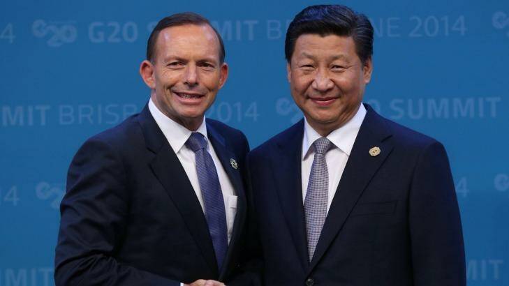 Prime Minister Tony Abbott with Chinese President Xi Jinping at the G20 leaders' summit on the weekend. The pair are expected to sign a free trade agreement on Monday. Photo: Andrew Meares