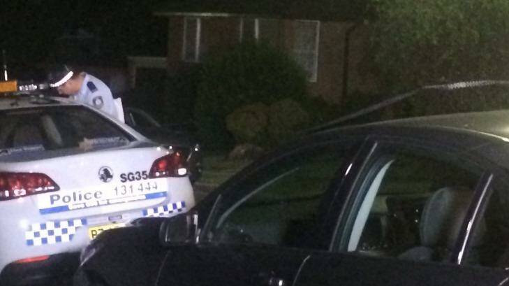 Police in front of the Bexley home where a woman was stabbed to death and her daughter was injured. Photo: Nick Moir