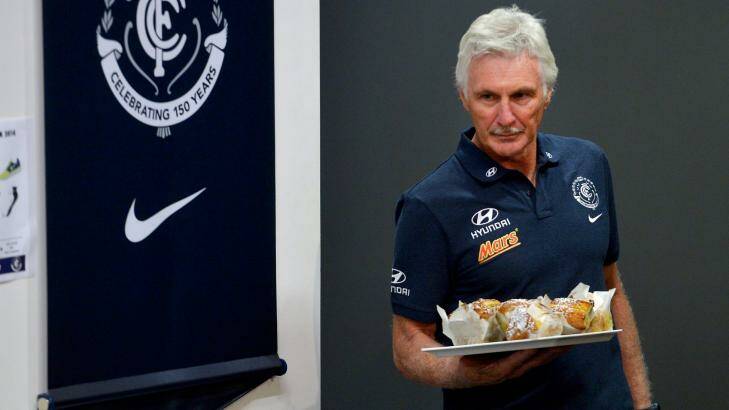 In this case, Mick Malthouse had muffins for the media. Photo: Joe Armao