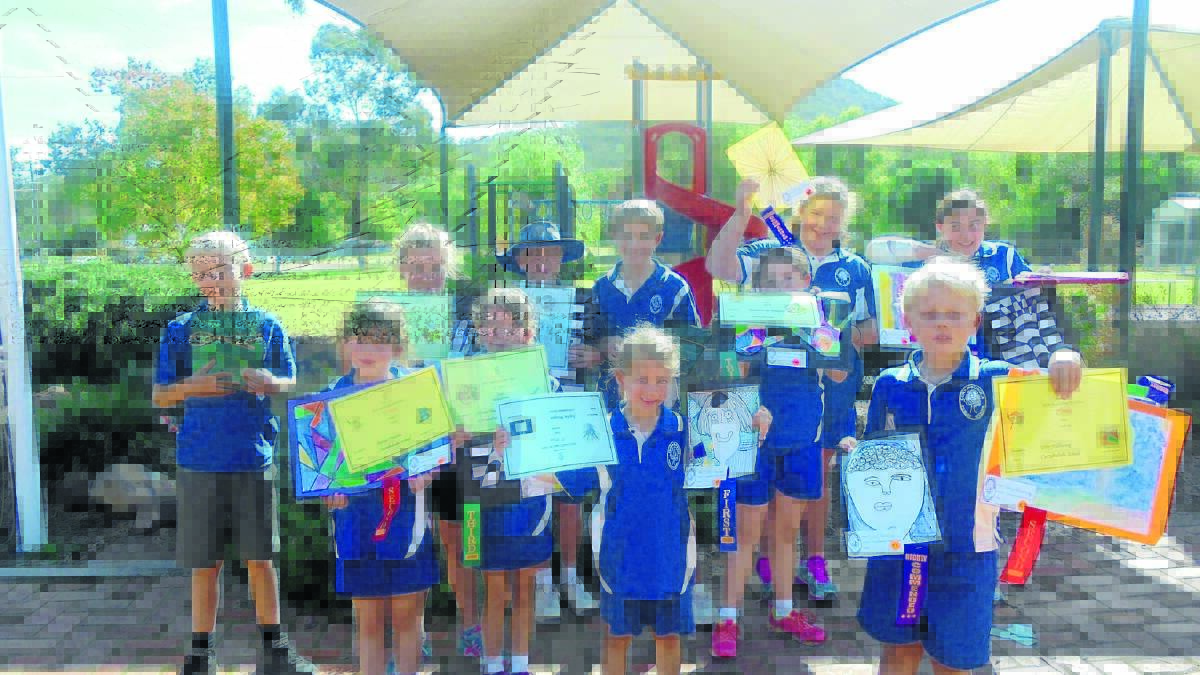 The Currabubula School Small School Art Show winners were, back  Alex Nibbering, Phebe McNamara, Beau Dallas, Ethan Campbell, Klaudia Crump and Joanne Tuckwell; and front  Sophie Vincent, Alyssa Vincent, Sophie Morgan, Maarteen Van Bodegom and Toby Nibbering.