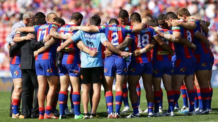 Brothers in arms: Knights players before kick-off. Photo: Jonathan Carroll