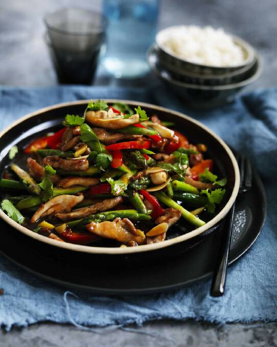 Neil Perry's stir-fried chicken and asparagus <a href="http://www.goodfood.com.au/good-food/cook/recipe/stirfried-chicken-and-asparagus-20140811-3dhan.html"><b>(recipe here).</b></a> Photo: William Meppem