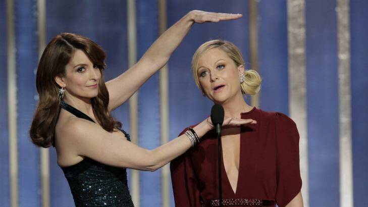 Funny business ... Fey and Poehler hosting their first Golden Globes in 2012. 