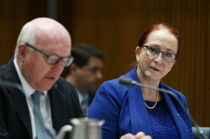 Emeritus Professor Rosalind Croucher with Attorney-General Senator George Brandis during Senate estimate hearings at Parliament House Canberra on Tuesday 24 October 2017. Fedpol. Photo: Andrew Meares 