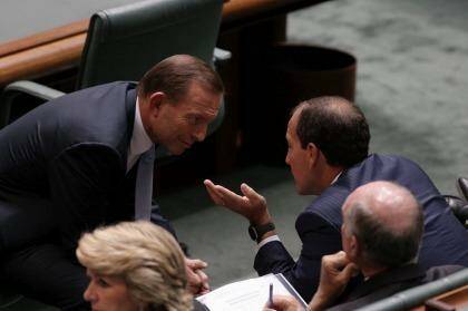 Mal Brough - speaking with Tony Abbott in the Parliament last year - threatened to speak out against the $20 GP rebate cut. Photo: Andrew Meares