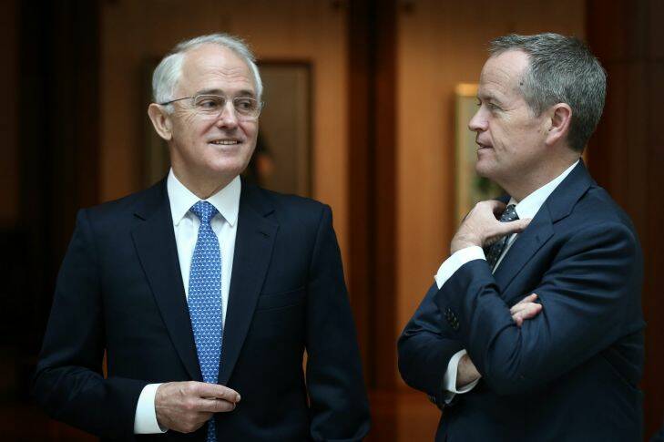 Prime Minister Malcolm Turnbull and Opposition leader Bill Shorten in conversation during the ceremony to sign the condolence book for former Prime Minister of Israel Shimon Peres, at Parliament House in Canberra on Monday 10 October 2016. Photo: Alex Ellinghausen