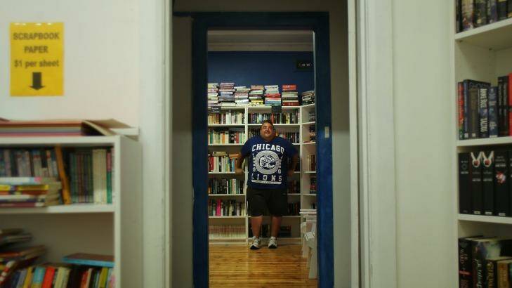 After struggling to find employment, Sean Nolly is now working as a bookseller at Blue House Books in Parramatta. Photo: Kate Geraghty