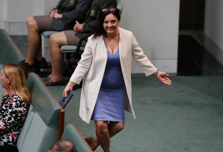 Emma Husar celebrates not being ejected from question time at Parliament House in Canberra on Thursday 30 March 2017. Photo: Andrew Meares 