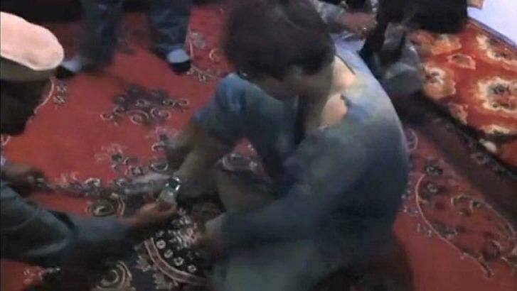 Footage believed to be that of Zainullah Naseri under interrogation.  Photo: ABC
