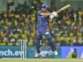 Marcus Stoinis cuts for four during his magnificent 124 not out for Lucknow Super Giants in the IPL. (AP PHOTO)