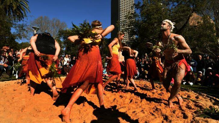Tim Bishop (right) and the Jannawi Dance Clan  in Hyde Park. Photo: Kate Geraghty