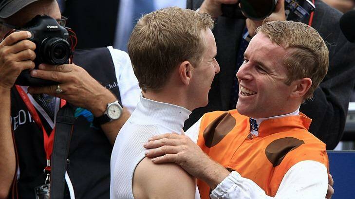 Brotherly love: Nathan Berry (left) congratulates Tommy after Tommy took out the Golden Slipper on Overreach in 2013. Photo: Jenny Evans