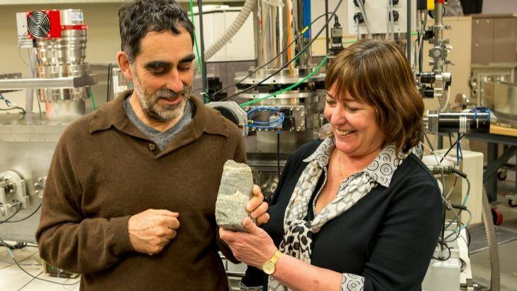 Professor Allen Nutman (left) of the University of Wollongong and Professor Vickie Bennett of the Australian National University with some of the rock evidence of 3.7-billion-year-old stromatolite fossils.