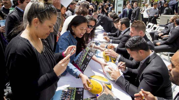 The Kiwis sign autographs for fans. Photo: Maarten Holl