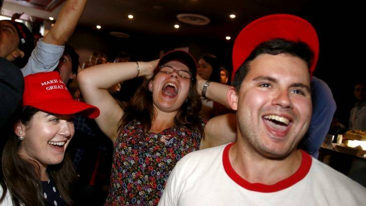 Donald Trump fans cheer at the United States Studies Centre at the University of Sydney. Photo: Daniel Munoz