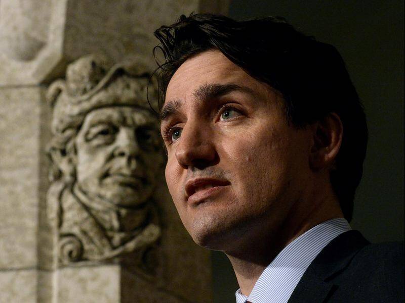 Canada's Justin Trudeau regrets using the word 'peoplekind', saying it was a dumb joke.