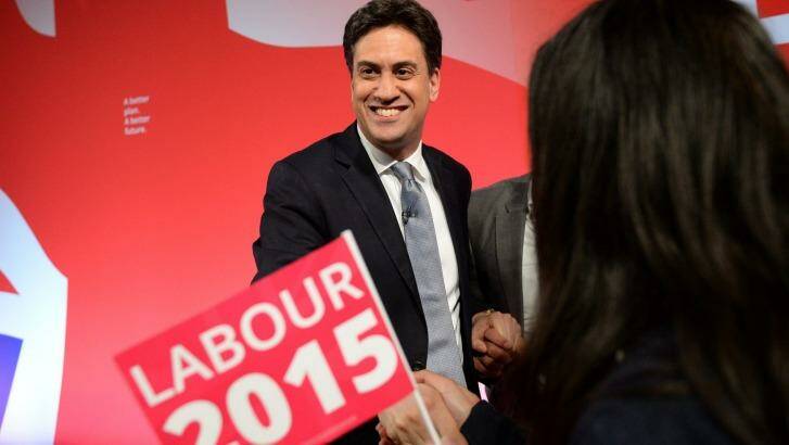 Leader of the opposition Labour Party, Ed Miliband smiles as he greets supporters in Leeds, northern England on Wednesday. Photo: Oli Scarff